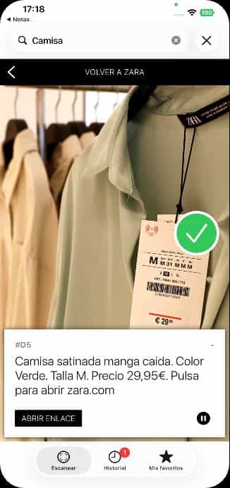 Schermata dell’app di Zara con il segno di spunta dopo aver rilevato il capo: «Camicia satinata manica scesa, taglia M, 29,95 €».