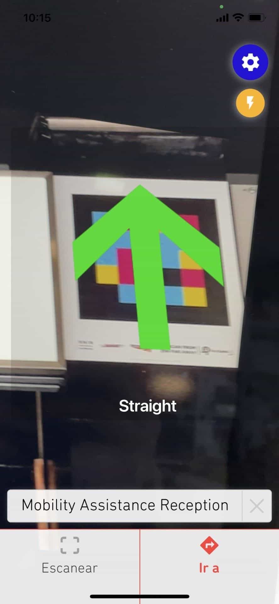 NaviLens GO app capture at Euston: scanned code augmented with a green «Straight» arrow guiding to «Mobility Assistance Reception»