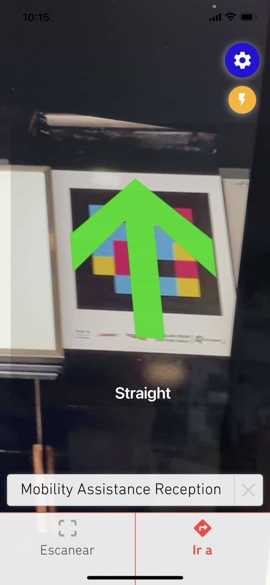 NaviLens GO app capture at Euston: scanned code augmented with a green «Straight» arrow guiding to «Mobility Assistance Reception»