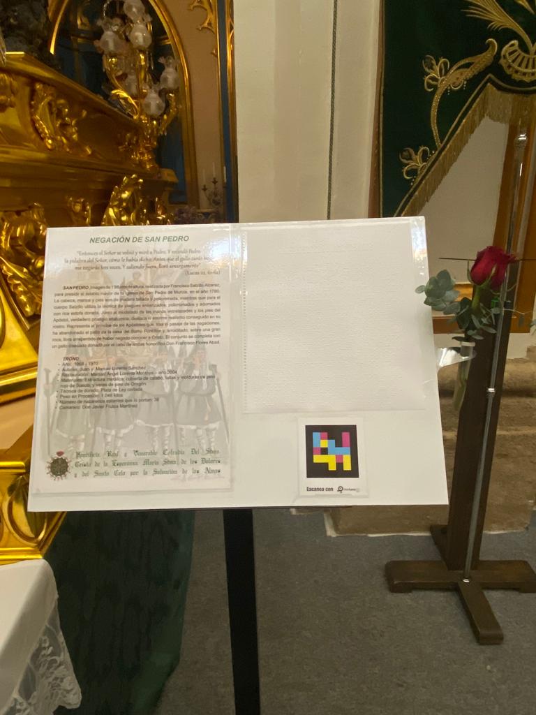 Black lectern with the accessible caption of the «Denial of Saint Peter» throne