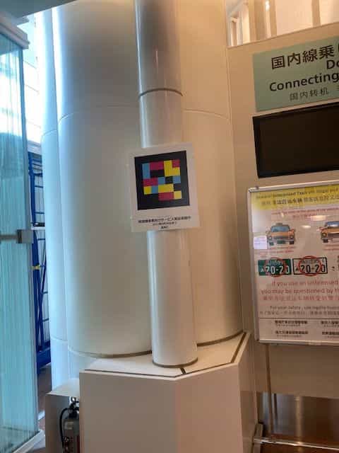 “Domestic Connecting” column with NaviLens code and licensed taxi notice