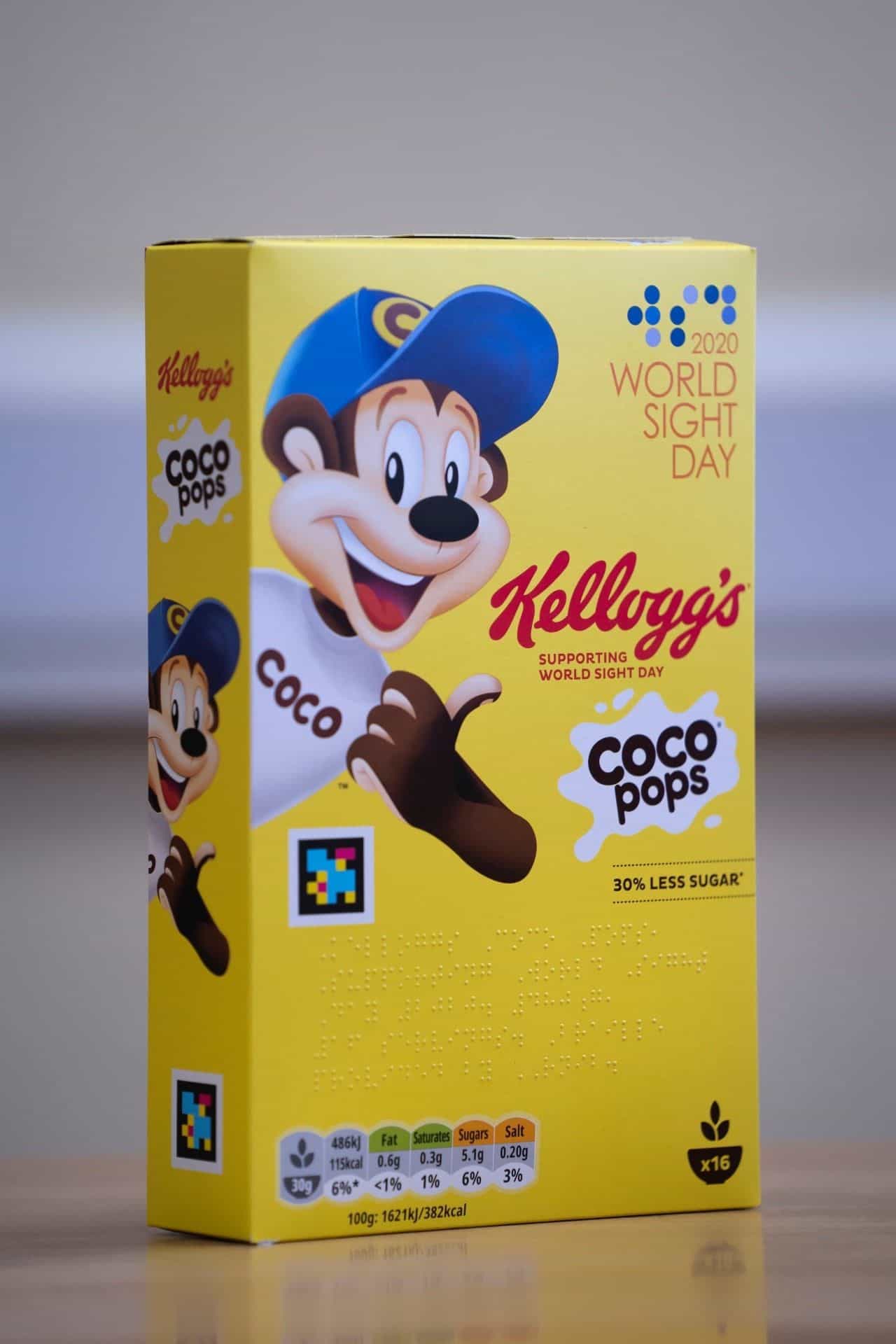Coco Pops box with printed NaviLens code being read from the phone of a blind shopper