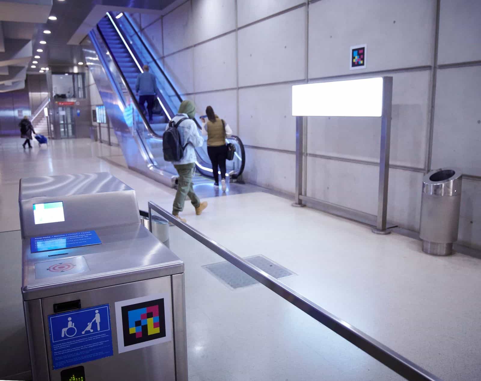 Metro Bilbao — Fare gate and passage area with NaviLens code next to the element