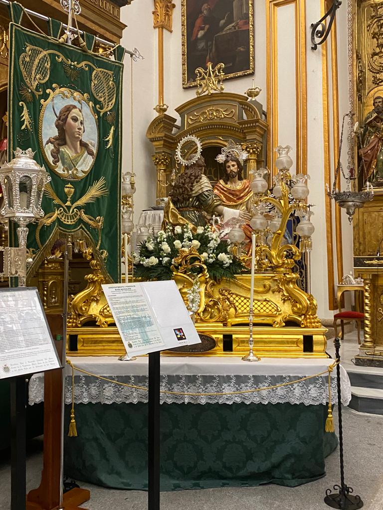 Throne of «Mary Magdalene's Repentance and Forgiveness» with green banner and lectern with accessible caption and NaviLens code