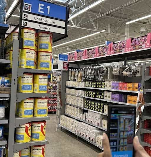 Walmart aisle end-cap with a NaviLens code above the section sign